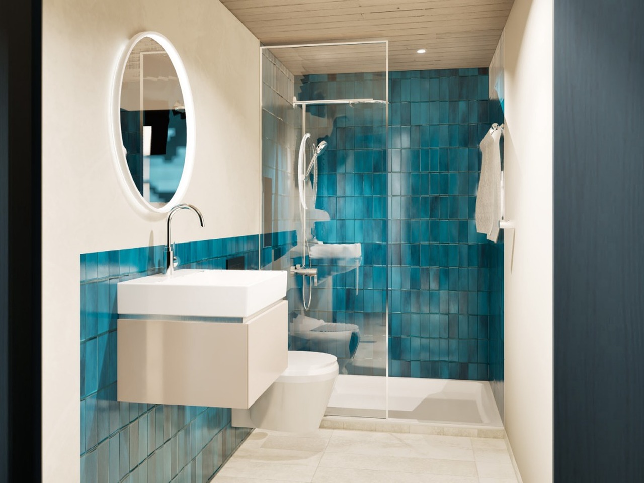 	Badezimmer mit blauen Fliesen und begehbarer Dusche im Schiffli Boutique Apartment Rapperswil