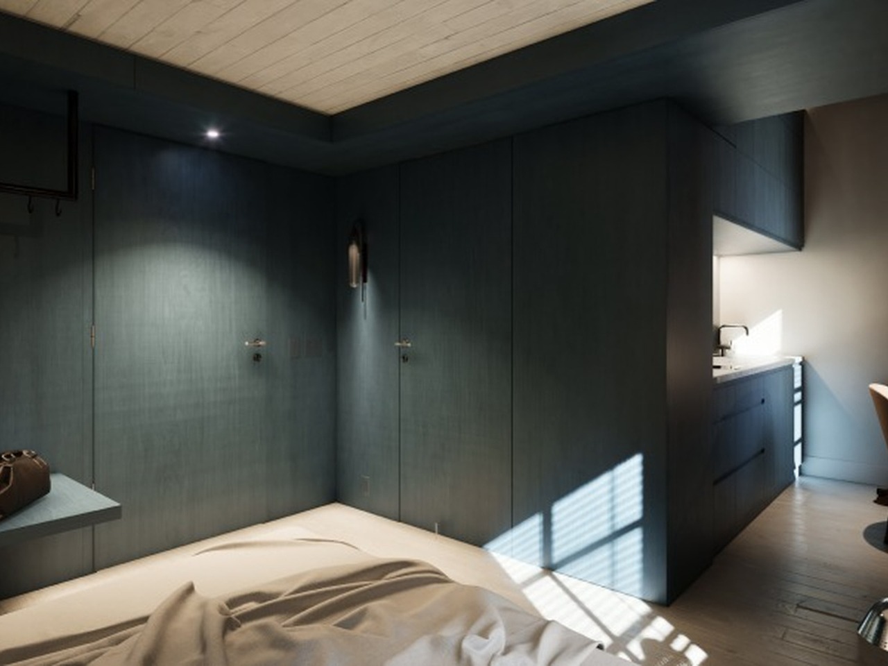 	Badezimmer mit blauen Fliesen und begehbarer Dusche im Schiffli Boutique Apartment Rapperswil